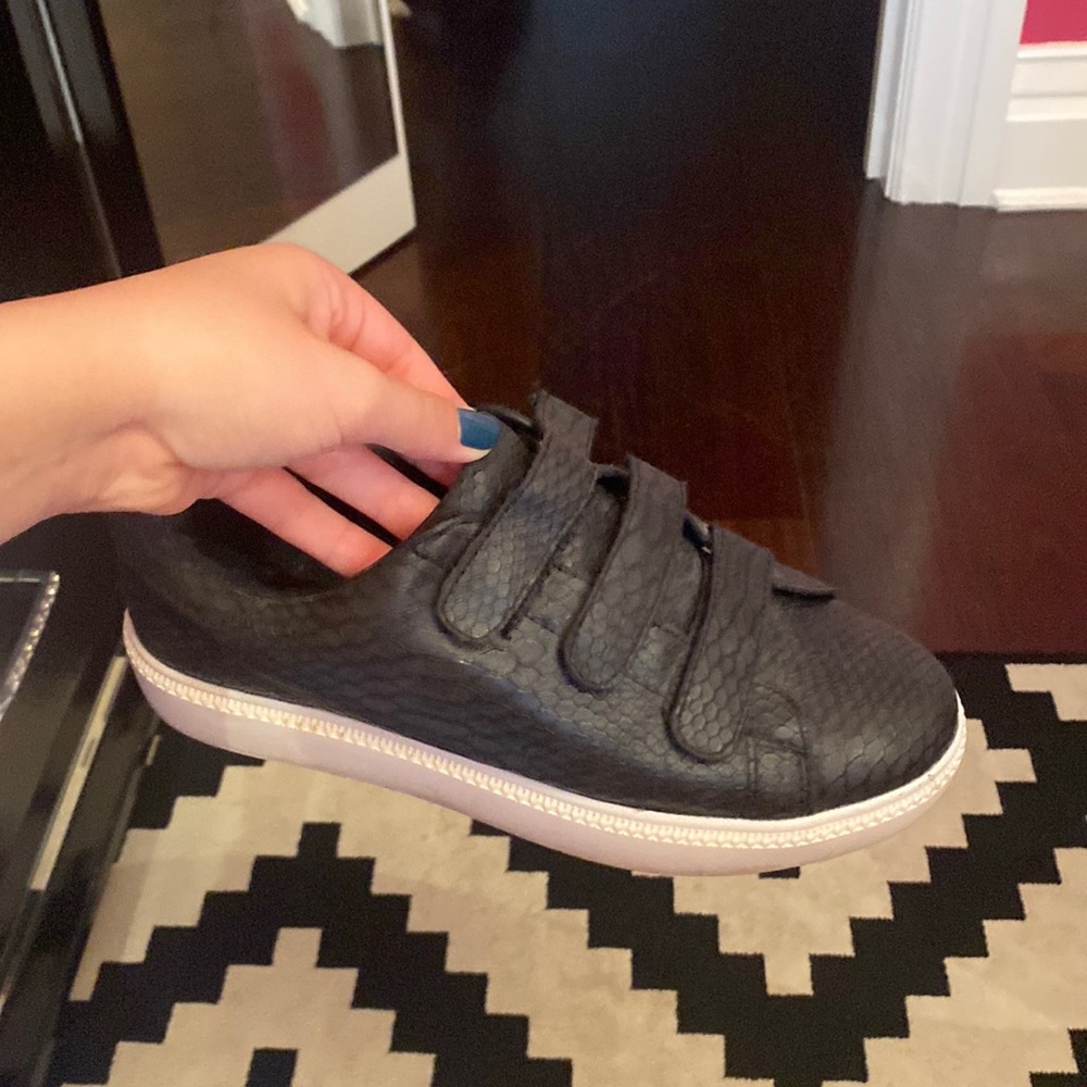 Black snake sneakers.